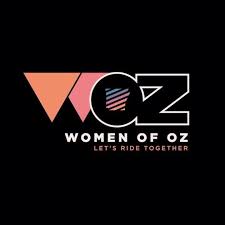 Women of Oz logo (features "WOZ" in white, pink, and light blue over a dark navy blue background)