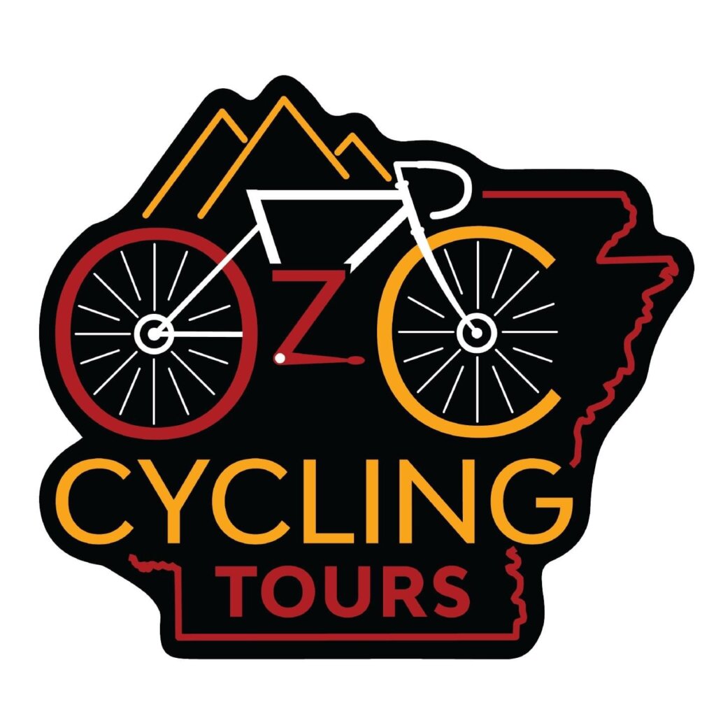 Oz Cycling Tours Logo (Oz Cycling Tours in red and yellow on a black background in the shape of the state of Arkansas)