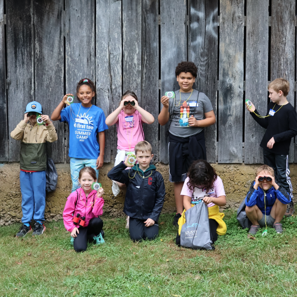 Kids smiling for a picture at the Homestead at Coler