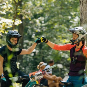 Mountain Bikers fist-bumping at Coler